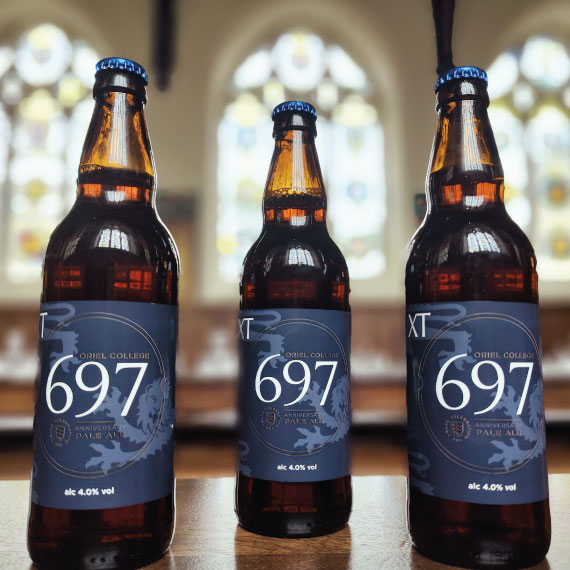 Three bottles of 697 Oriel College beer