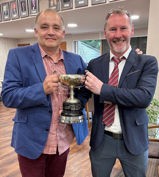 Samuel Henry (left) and Colin Bailey (right) holding the winning trophy