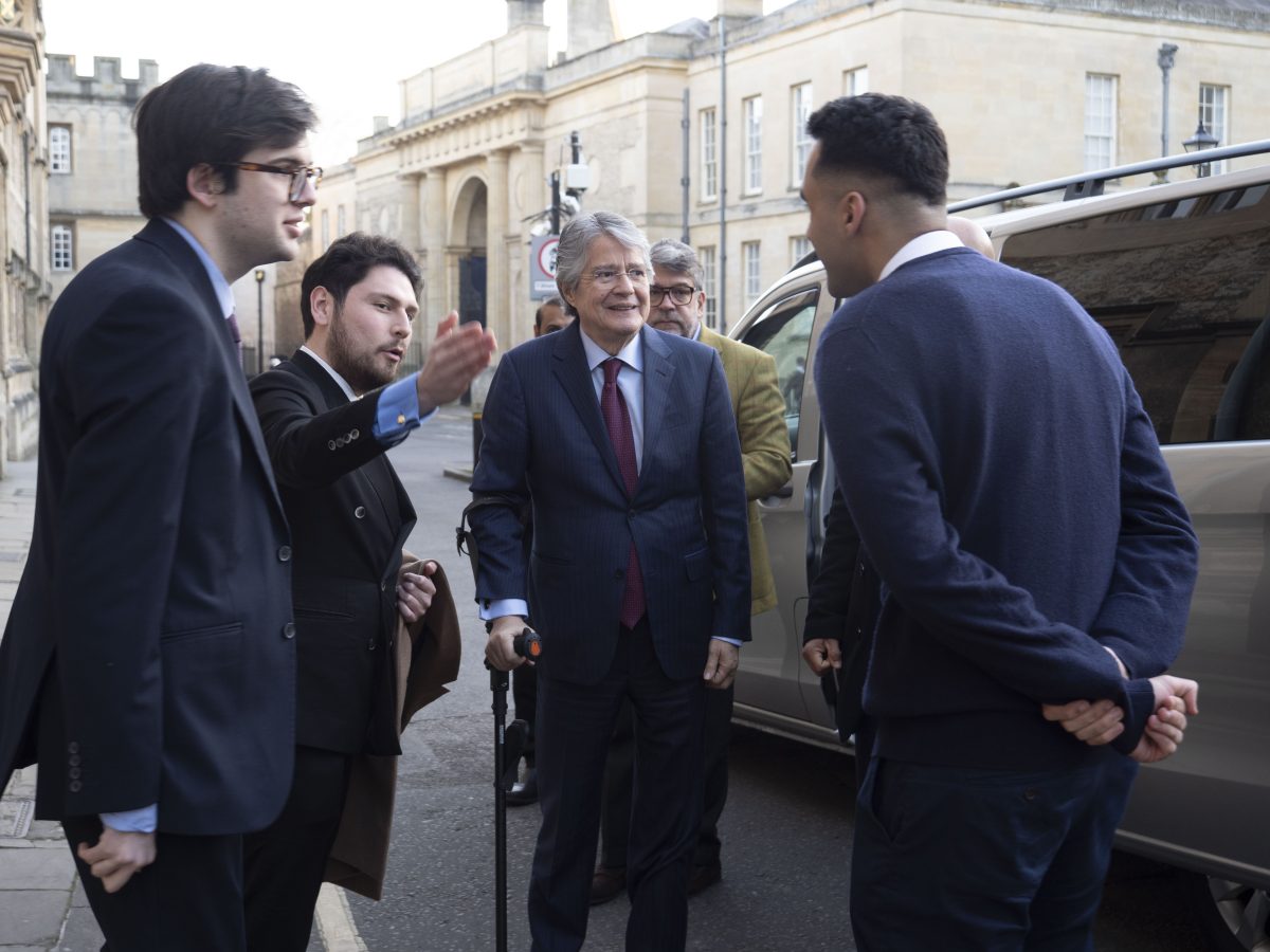Former Ecuadorian President Lasso being greeted by students outside Oriel College